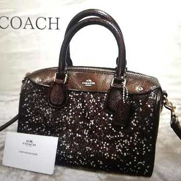 Brand new COACH brown bag with glittering star mo… - image 1