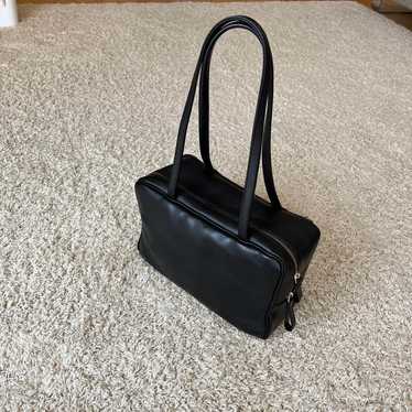 Genuine leather shoulder bag.