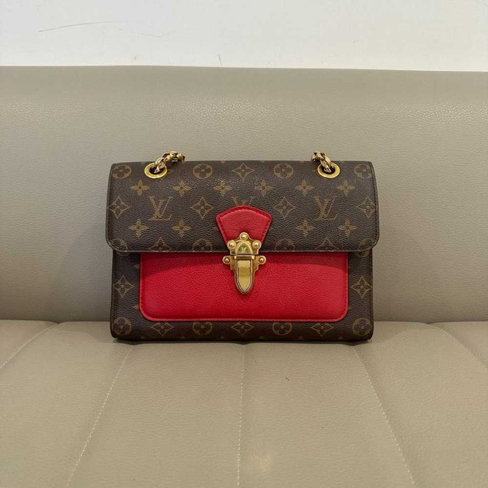 Louis Vuitton Victoire leather handbag - image 2