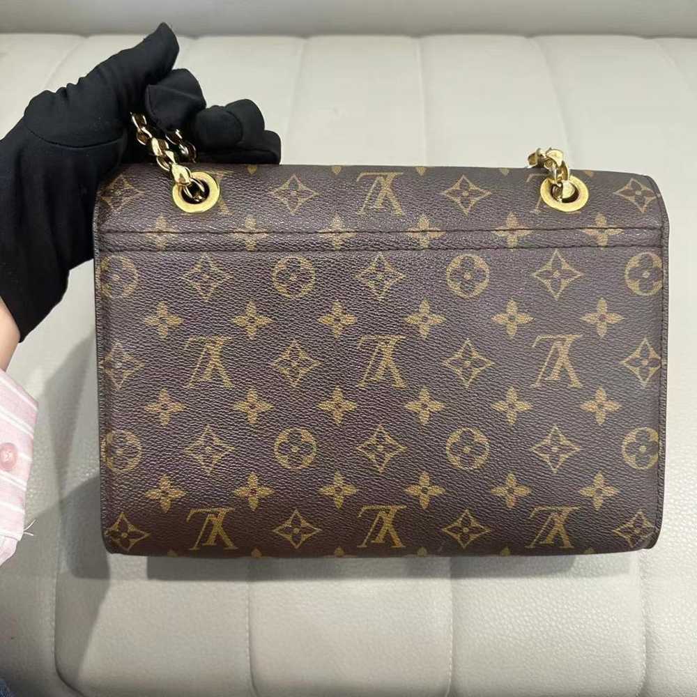 Louis Vuitton Victoire leather handbag - image 3