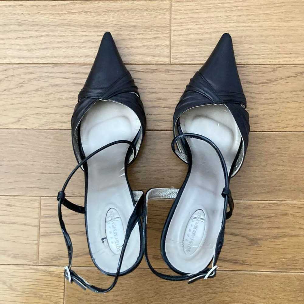 Black elegant pumps with 7cm heels. - image 2