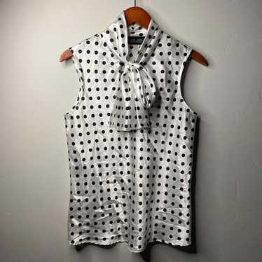 White and black polka dot blouse