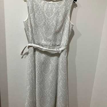 White sleeveless A-line dress. - image 1