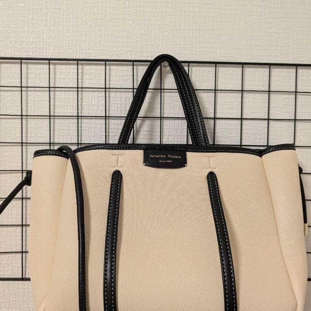 Beige canvas tote bag. - image 1