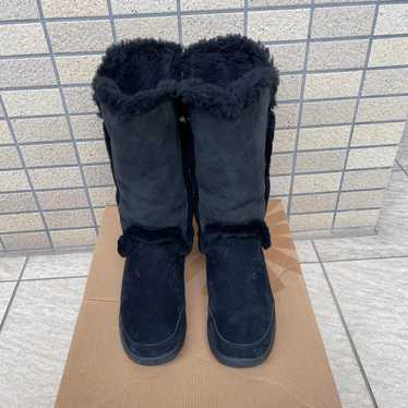 UGG sheepskin boots in black.