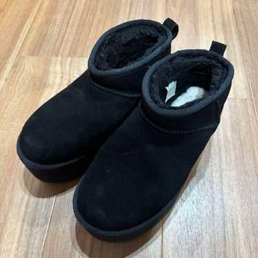 UGG black sheepskin boots.