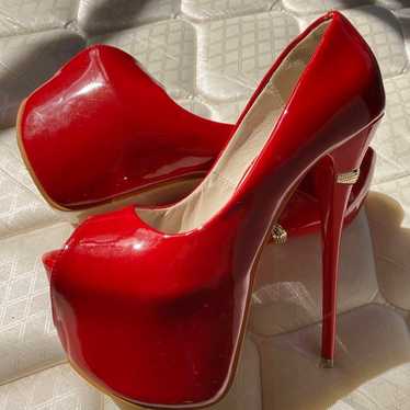 Red open-toe high heels, cabaret heel.