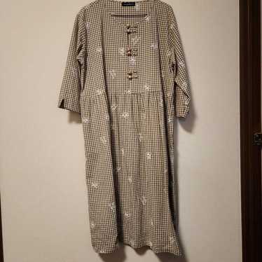 Beige check pattern dress at the drugstore. - image 1