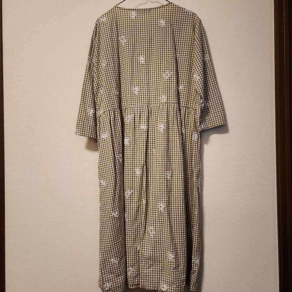 Beige check pattern dress at the drugstore. - image 2