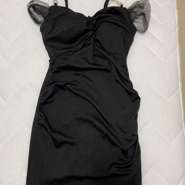 Black tight dress with sheer sleeves. - image 1