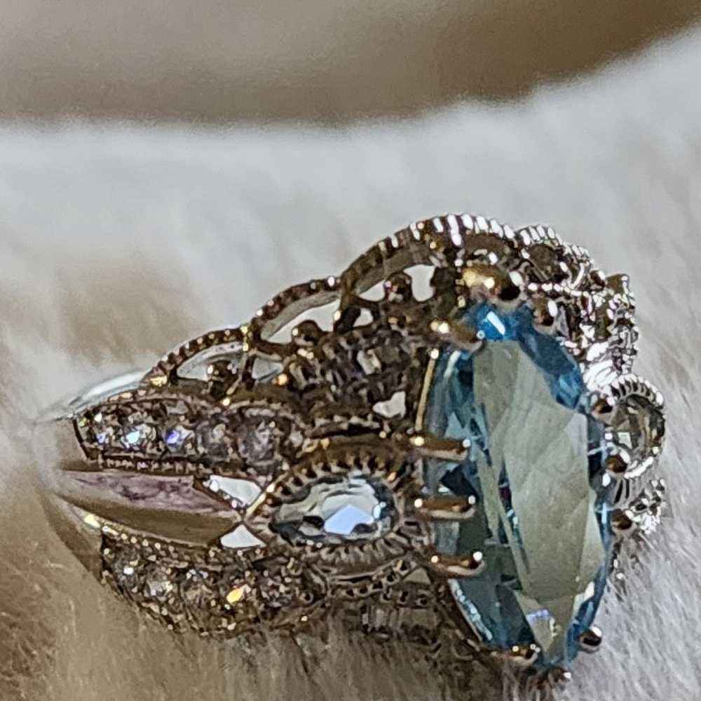 Stunning sterling silver blue topaz ring - image 1