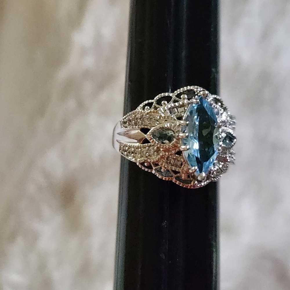 Stunning sterling silver blue topaz ring - image 6