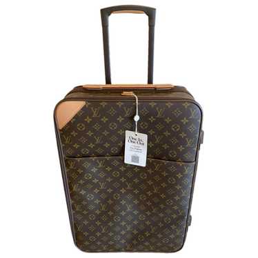 Louis Vuitton Pegase leather travel bag