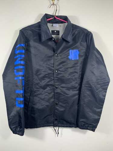UNDEFEATED Champion ナイロン コーチジャケット L オリーブ UNDEFEATED Champion ナイロン コーチジャケット L オリーブ