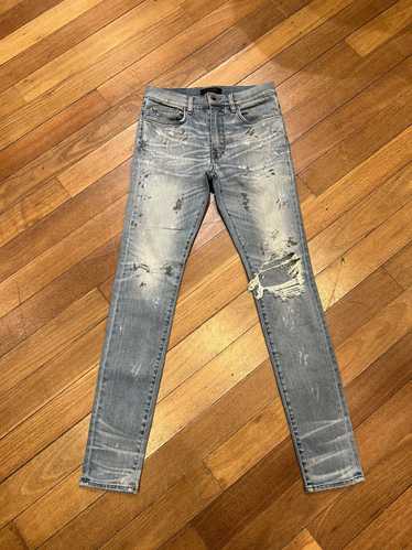 Amiri Amiri distressed paint splatter denim jeans