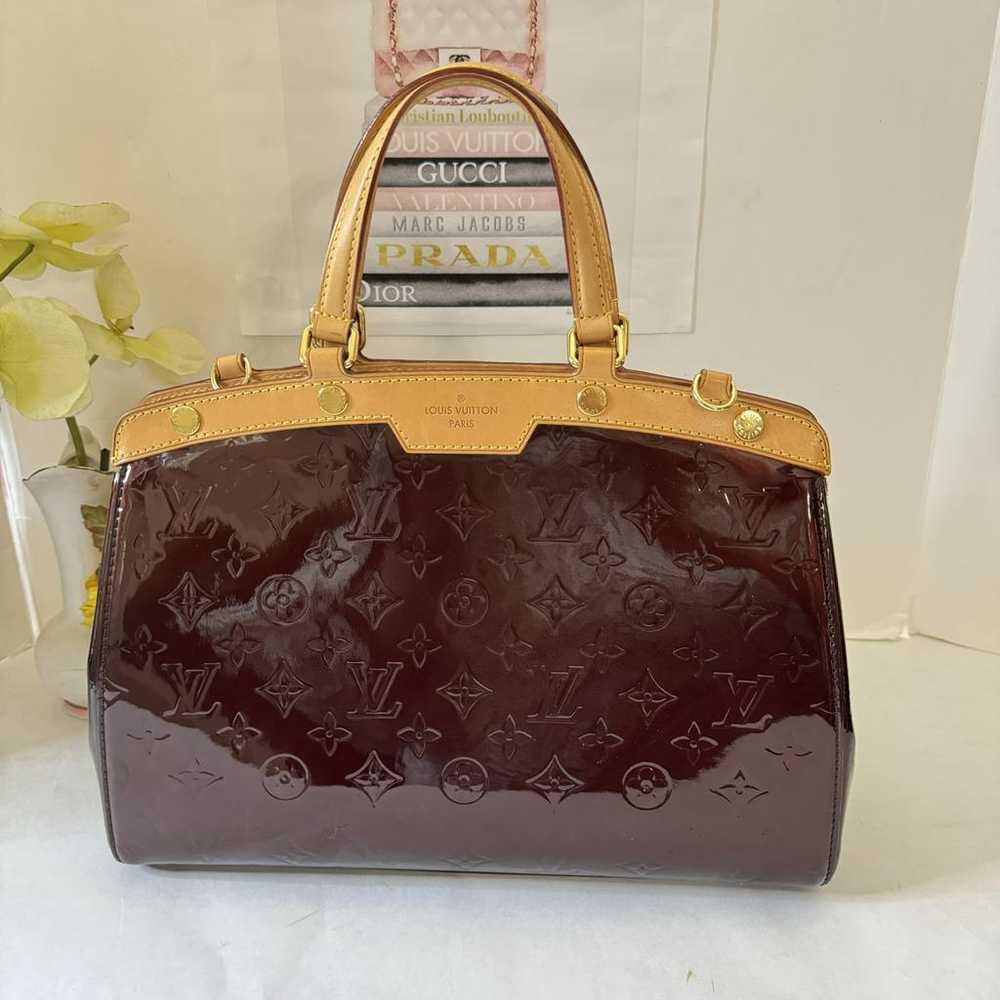 Louis Vuitton Bréa patent leather handbag - image 10