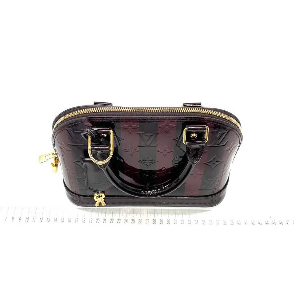 Louis Vuitton Alma BB patent leather handbag - image 2