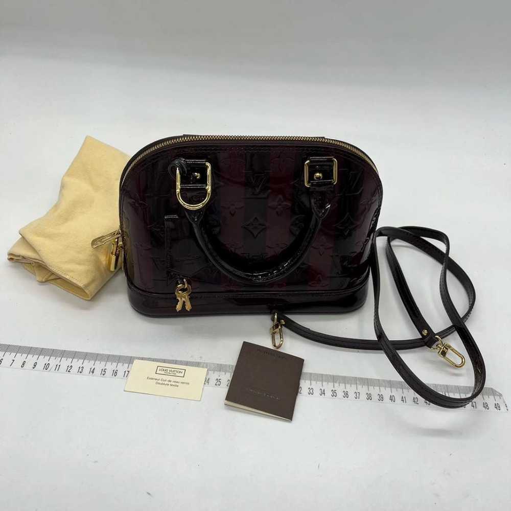 Louis Vuitton Alma BB patent leather handbag - image 3