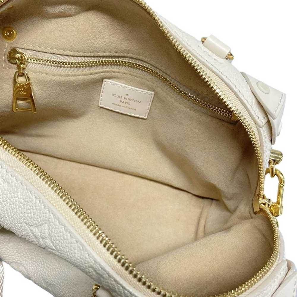 Louis Vuitton Petite Malle Souple leather handbag - image 10