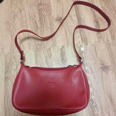 Longchamp red leather shoulder bag.