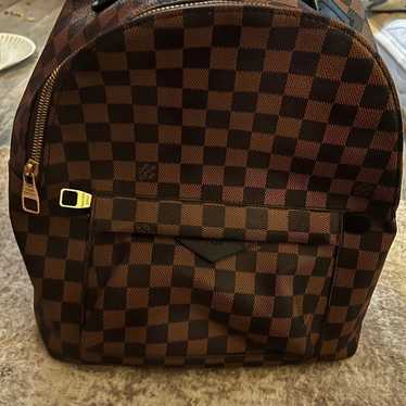 Black and brown backpack - image 1