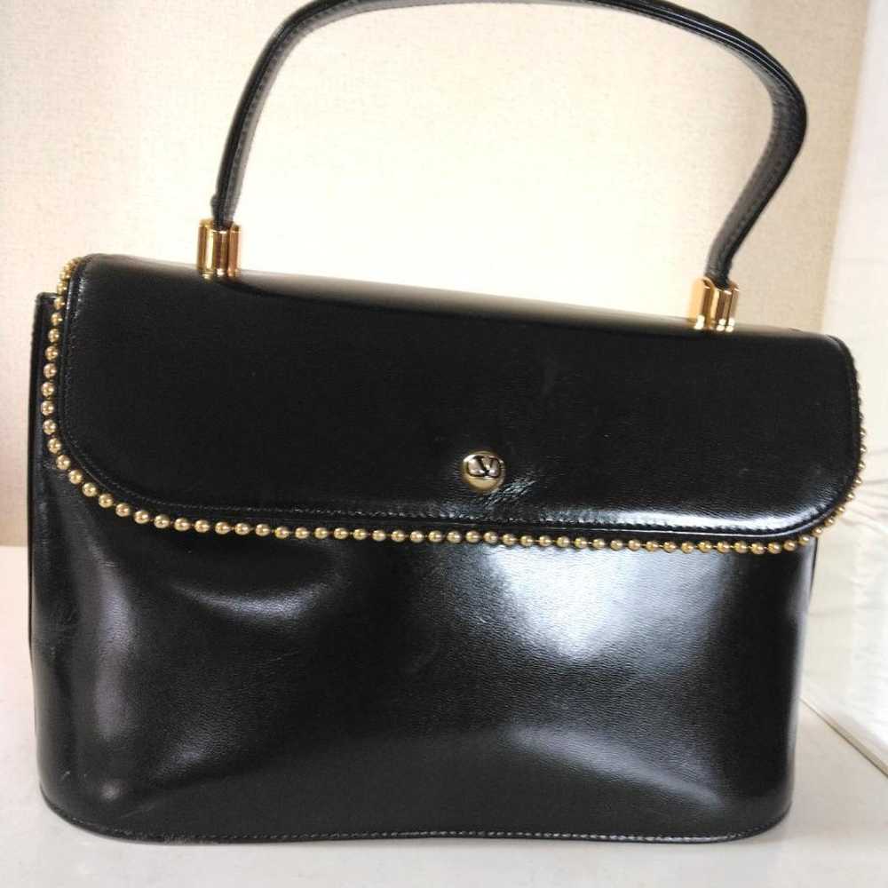 Valentino Garavani handbag, black, like new - image 1