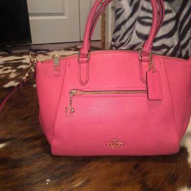 A brand new pink coach purse