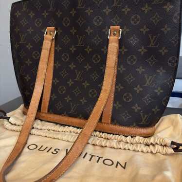 Louis Vuitton Babylon hand bag with duster bag