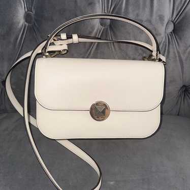 Kate Spade patent leather handbags