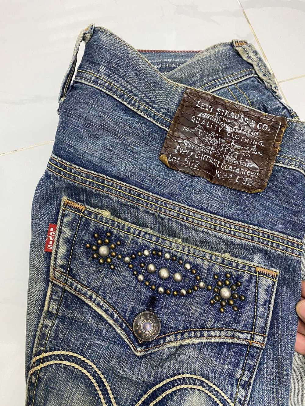 Levi's VINTAGE LEVIS 502 DISTRESSED BAGGY DENIM J… - image 9