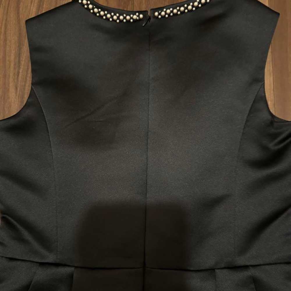 Try-on only  
KUMIKYOKU black sleeveless dress  
… - image 4