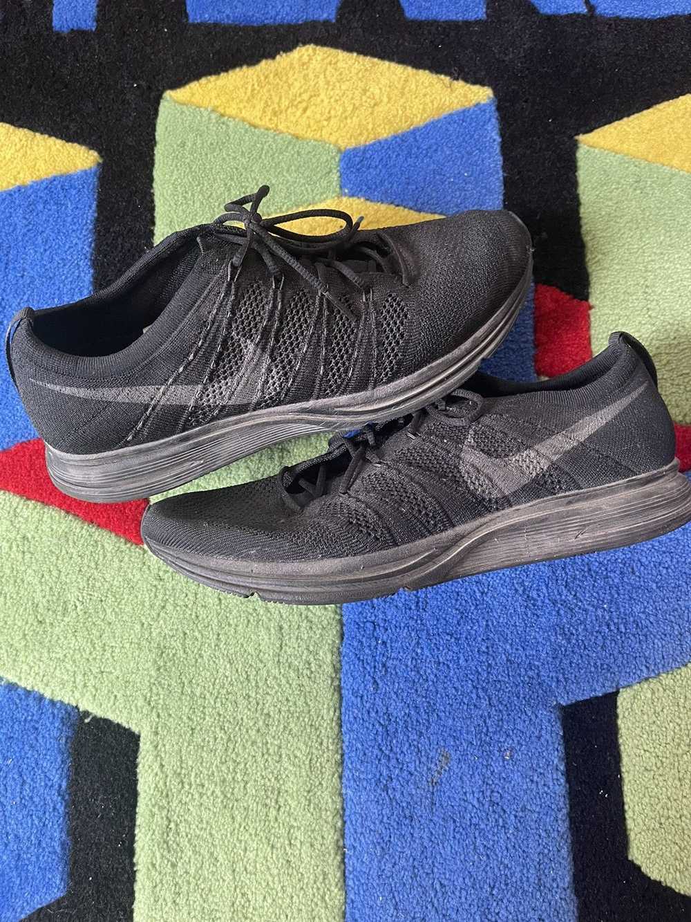 Nike NIKE FLYKNIT TRAINER - TRIPLE BLACK - image 1