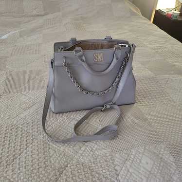 I am selling a beautifu silver bag