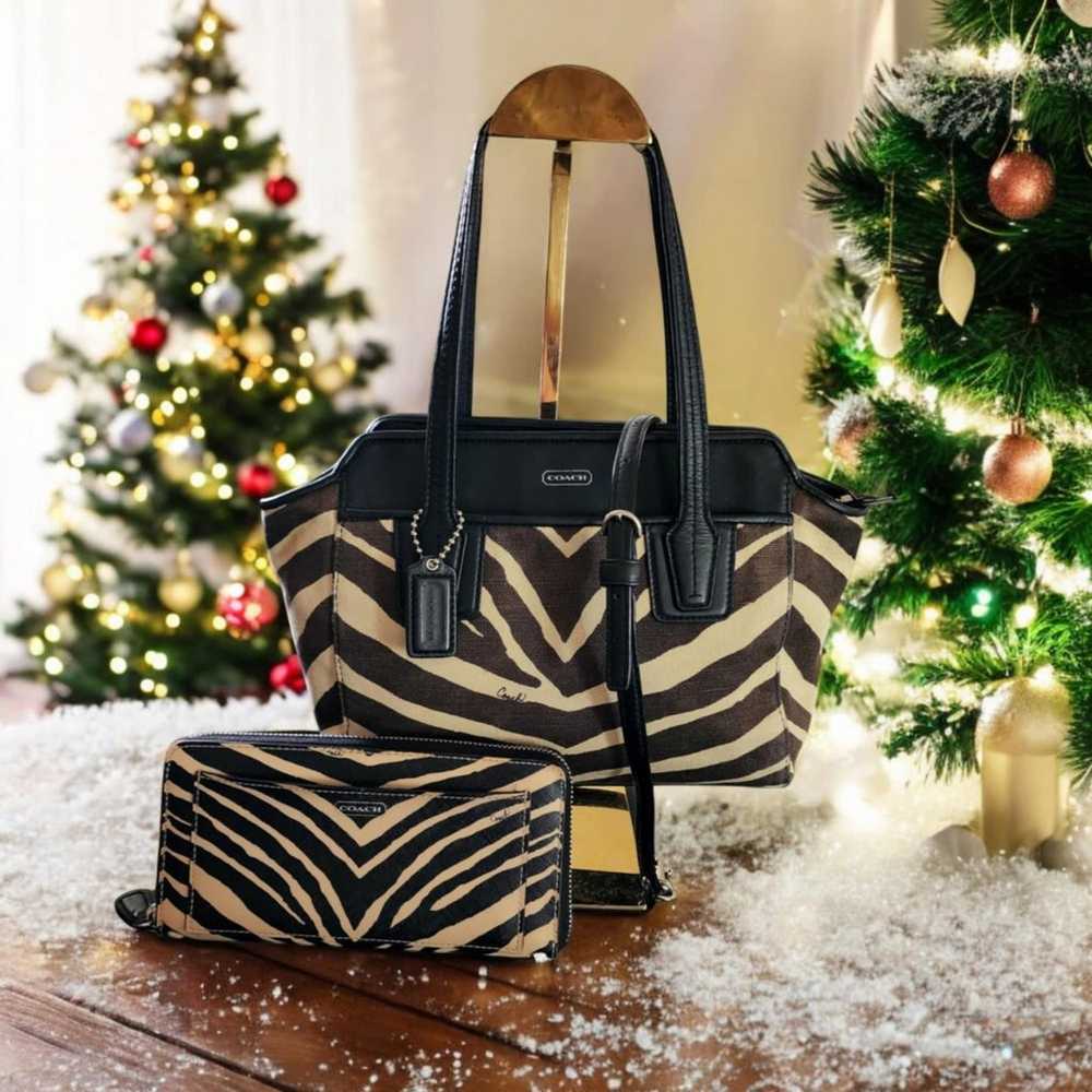 Coach Taylor zebra print canvas and black leather… - image 1