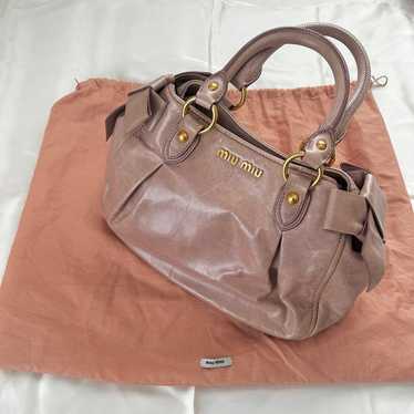 Miu Miu beige leather bag with storage bag include