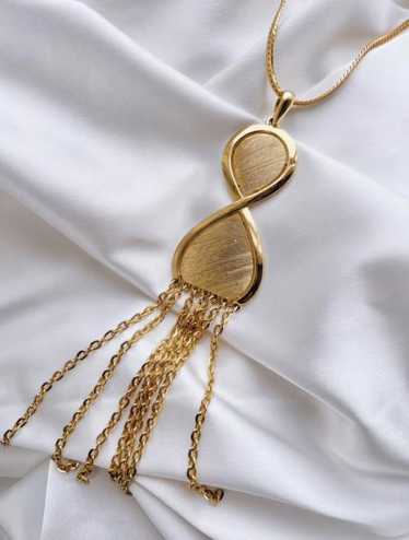 70s gold tone infinity tassel necklace