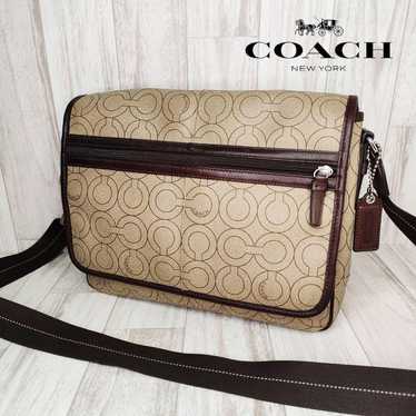 55 COACH Signature Shoulder Bag