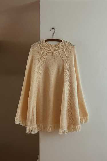 1970's BUTTERCREAM KNIT FRINGE PONCHO