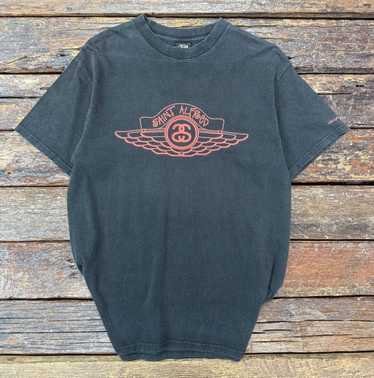 Vintage store Stussy x Saint Alfred Black & Gold Wing Logo Chicago Tribe T Shirt Sz M