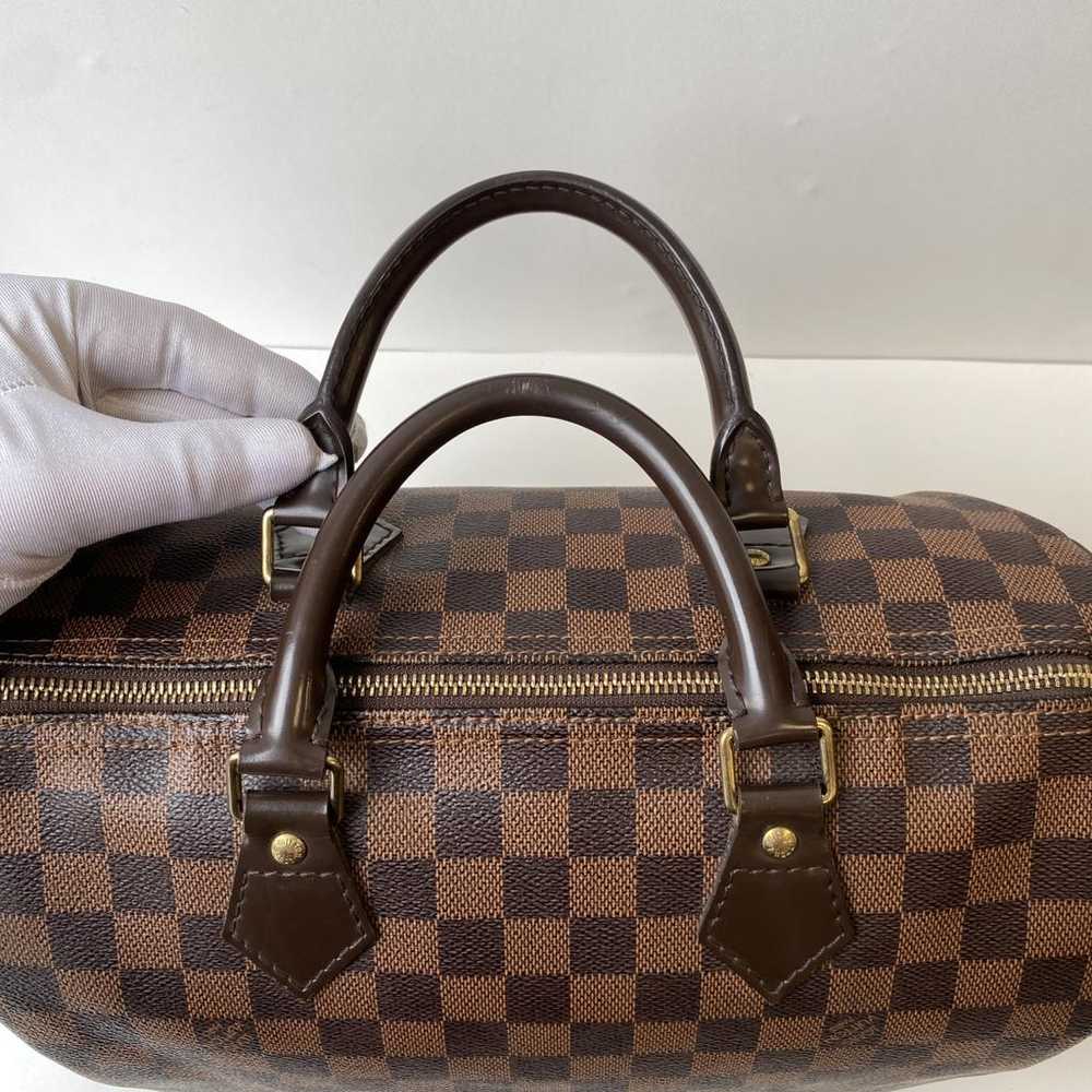 Louis Vuitton Speedy patent leather handbag - image 10