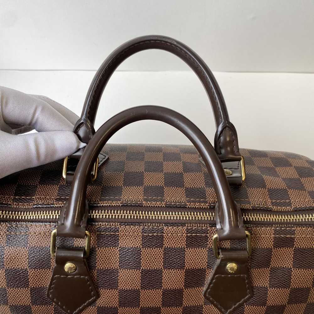 Louis Vuitton Speedy patent leather handbag - image 9