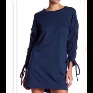 Lush dress with adjustable sleeves.