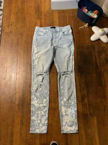 Amiri Amiri bleached distressed jeans