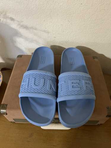 Hunter Rubber Hunter Logo Slides