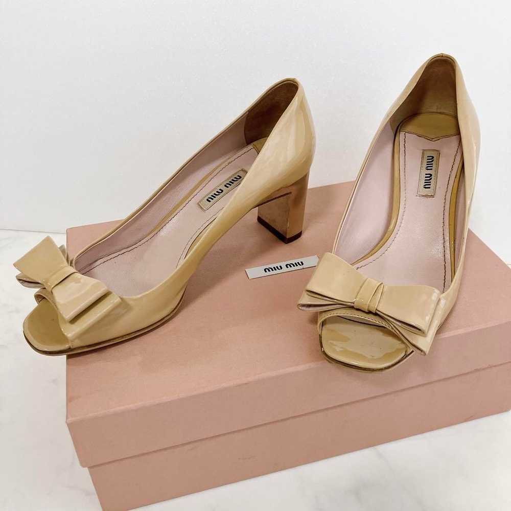 【Excellent Condition】miumiu Gem Heel Pumps with J… - image 1