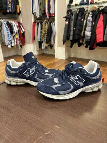 New Balance 2002R Protection Pack “Navy Grey”