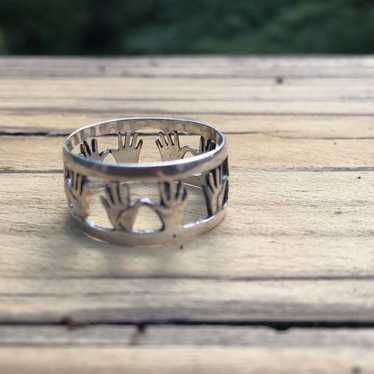 Sterling silver band ring with hands - image 1