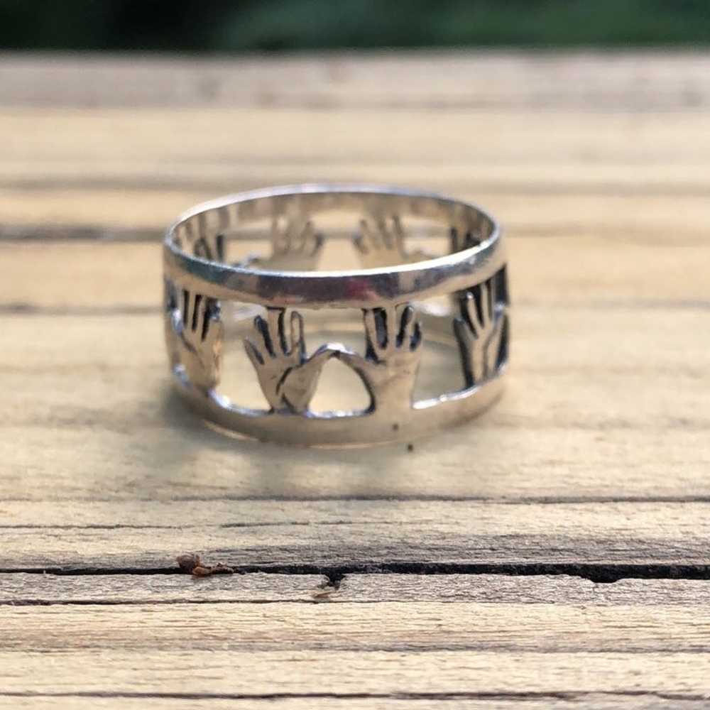 Sterling silver band ring with hands - image 2