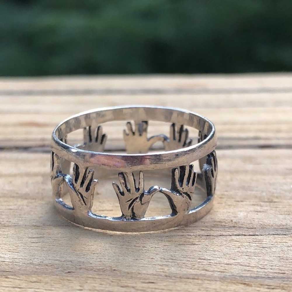 Sterling silver band ring with hands - image 6