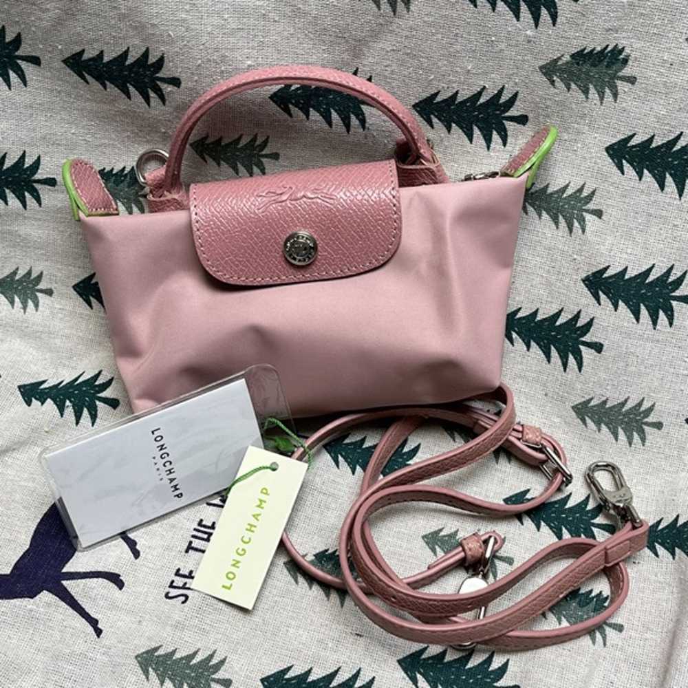 Light pink handbag with crossbody strap - image 1